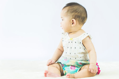 bright portrait of adorable babyの写真素材