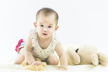 bright portrait of adorable babyの写真素材