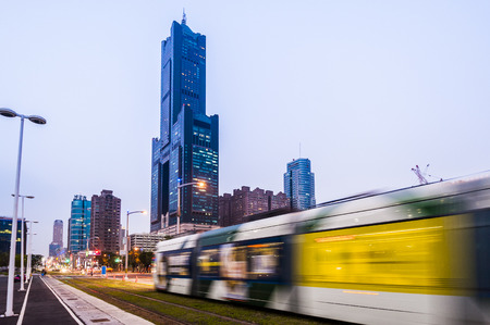 Kaohsiung, Taiwan - November 25 : View of light rail tram and the skyline in Kaohsiung, Taiwan on November 25, 2016. The light rail system in Kaohsiung is the first light rail transit in Taiwan.のeditorial素材