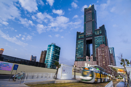 Kaohsiung, Taiwan - JANUARY 25 : View of light rail tram and the skyline in Kaohsiung, Taiwan on JANUARY 25, 2017. The light rail system in Kaohsiung is the first light rail transit in Taiwan.のeditorial素材