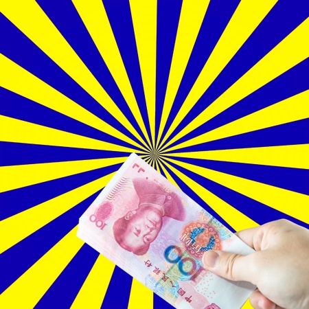 Chinese currency and handの写真素材