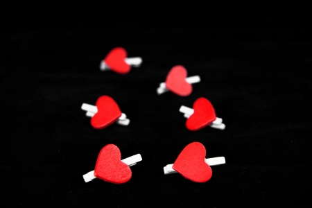 red hearts on black backgroundの写真素材