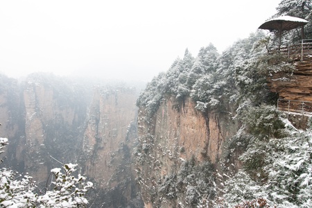 zhangjiajie national park in winter with snow and fog,Hunan Chinaの写真素材