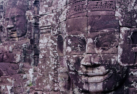 people face of stone in Cambodiaの写真素材