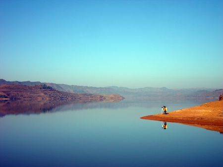 Blue color sky and blue color lakeの写真素材