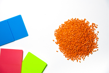 Plastic granules close up for holding,Colorful plastic granules with white background. and dollar money,Plastic Business.の写真素材