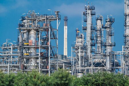 Industrial zone,The equipment of oil refining,Close-up of industrial pipelines of an oil-refinery plant,Detail of oil pipeline with valves in large oil refinery.の写真素材