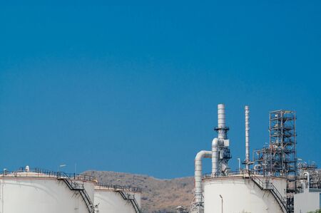 Industrial zone,The equipment of oil refining,Close-up of industrial pipelines of an oil-refinery plant,Detail of oil pipeline with valves in large oil refinery.の写真素材