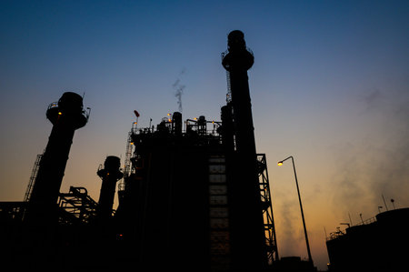 Glow light of petrochemical industry on sunset and Twilight sky ,Power plant,Energy power station...