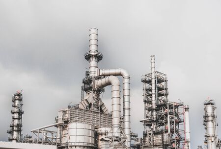 Industrial zone,The equipment of oil refining,Close-up of industrial pipelines of an oil-refinery plant,Detail of oil pipeline with valves in large oil refineryの写真素材