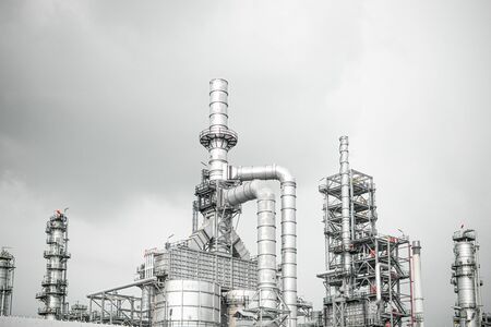 Industrial zone,The equipment of oil refining,Close-up of industrial pipelines of an oil-refinery plant,Detail of oil pipeline with valves in large oil refineryの写真素材