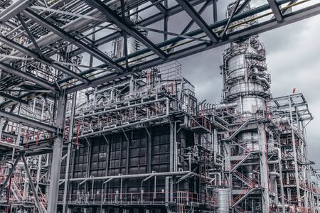 Industrial zone,The equipment of oil refining,Close-up of industrial pipelines of an oil-refinery plant,Detail of oil pipeline with valves in large oil refinery.の写真素材