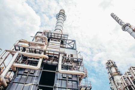 Industrial zone,The equipment of oil refining,Close-up of industrial pipelines of an oil-refinery plant,Detail of oil pipeline with valves in large oil refinery.の写真素材