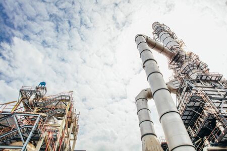 Industrial zone,The equipment of oil refining,Close-up of industrial pipelines of an oil-refinery plant,Detail of oil pipeline with valves in large oil refinery.の写真素材