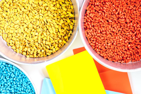 plastic granules close up for holding,Colorful plastic granules with white background.