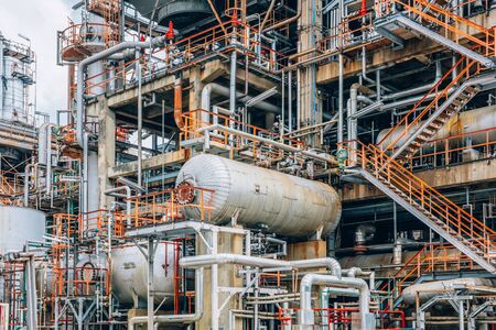 Industrial zone,The equipment of oil refining,Close-up of industrial pipelines of an oil-refinery plant,Detail of oil pipeline with valves in large oil refinery.のeditorial素材