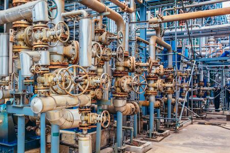 Industrial zone,The equipment of oil refining,Close-up of industrial pipelines of an oil-refinery plant,Detail of oil pipeline with valves in large oil refinery.のeditorial素材