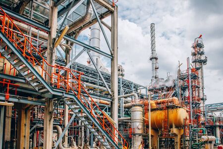 Industrial zone,The equipment of oil refining,Close-up of industrial pipelines of an oil-refinery plant,Detail of oil pipeline with valves in large oil refinery.のeditorial素材