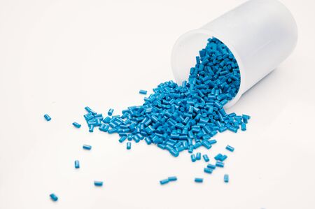 Plastic granules close up for holding,Colorful plastic granules with white background. and dollar money,Plastic Business,Plastic industry.の写真素材