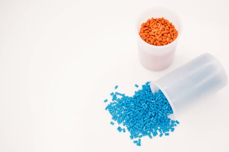 Plastic granules close up for holding,Colorful plastic granules with white background. and dollar money,Plastic Business,Plastic industry.の写真素材