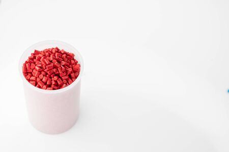 Plastic granules close up for holding,Colorful plastic granules with white background. and dollar money,Plastic Business,Plastic industry.の写真素材