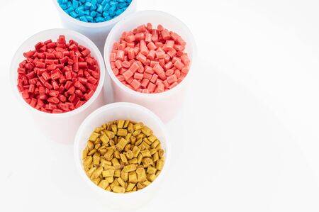 Plastic granules close up for holding,Colorful plastic granules with white background. and dollar money,Plastic Business,Plastic industry.の写真素材