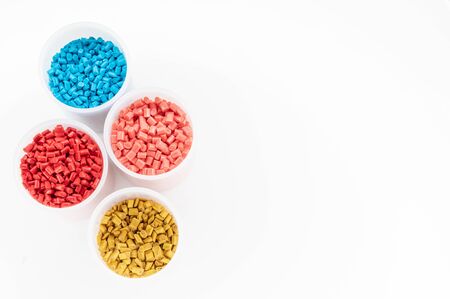 Plastic granules close up for holding,Colorful plastic granules with white background. and dollar money,Plastic Business,Plastic industry.の写真素材
