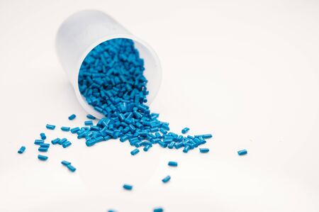Plastic granules close up for holding,Colorful plastic granules with white background. and dollar money,Plastic Business,Plastic industry.の写真素材