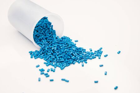 Plastic granules close up for holding,Colorful plastic granules with white background. and dollar money,Plastic Business,Plastic industry.の写真素材