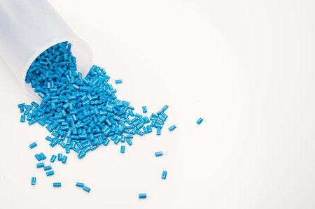 Plastic granules close up for holding,Colorful plastic granules with white background. and dollar...