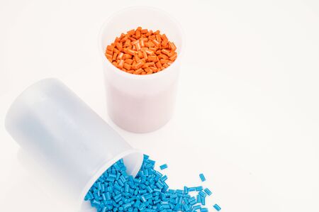 Plastic granules close up for holding,Colorful plastic granules with white background. and dollar money,Plastic Business,Plastic industry.の写真素材