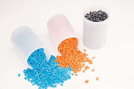 Plastic granules close up for holding,Colorful plastic granules with white background. and dollar money,Plastic Business,Plastic industry.の写真素材