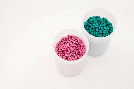 Plastic granules close up for holding,Colorful plastic granules with white background. and dollar money,Plastic Business,Plastic industry.の写真素材