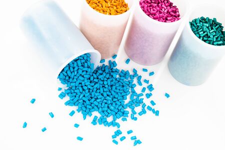 Plastic granules close up for holding,Colorful plastic granules with white background. and dollar money,Plastic Business,Plastic industry.の写真素材