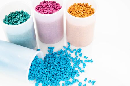Plastic granules close up for holding,Colorful plastic granules with white background. and dollar money,Plastic Business,Plastic industry.の写真素材
