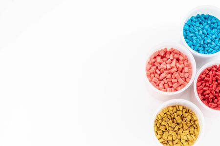 Plastic granules close up for holding,Colorful plastic granules with white background. and dollar money,Plastic Business,Plastic industry.の写真素材