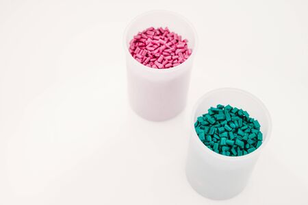 Plastic granules close up for holding,Colorful plastic granules with white background. and dollar money,Plastic Business,Plastic industry.の写真素材