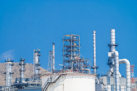 Industrial zone,The equipment of oil refining,Close-up of industrial pipelines of an oil-refinery plant,Detail of oil pipeline with valves in large oil refinery.の写真素材