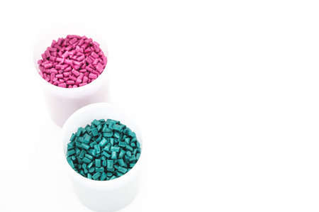 Plastic granules close up for holding,Colorful Plastic granules with white background.の写真素材