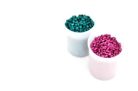 Plastic granules close up for holding,Colorful Plastic granules with white background.の写真素材
