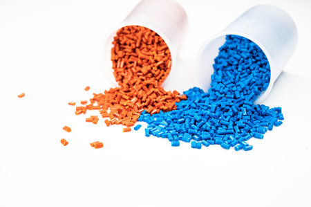 Plastic granules close up for holding,Colorful Plastic granules with white background.の写真素材