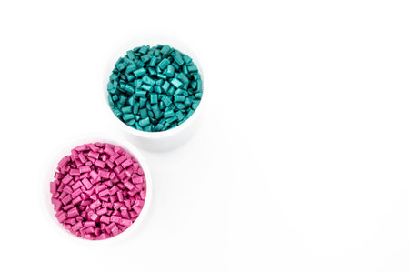 Plastic granules close up for holding,Colorful Plastic granules with white background.の写真素材