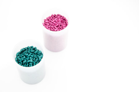 Plastic granules close up for holding,Colorful Plastic granules with white background.の写真素材