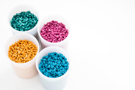 Plastic granules close up for holding,Colorful Plastic granules with white background.の写真素材