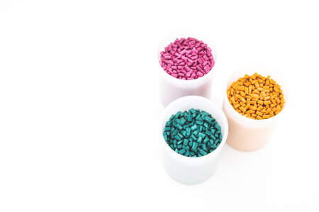 Plastic granules close up for holding,Colorful Plastic granules with white background.の写真素材