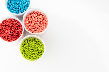 Plastic granules close up for holding,Colorful Plastic granules with white background.の写真素材
