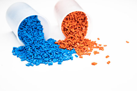 Plastic granules close up for holding,Colorful Plastic granules with white background.の写真素材