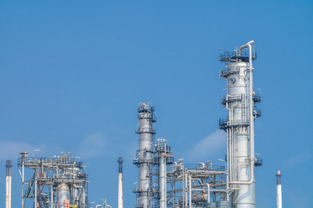 Industrial zone,The equipment of oil refining,Close-up of industrial pipelines of an oil-refinery plant,Detail of oil pipeline with valves in large oil refinery.の写真素材