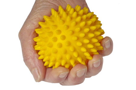 hand with massage ballの写真素材