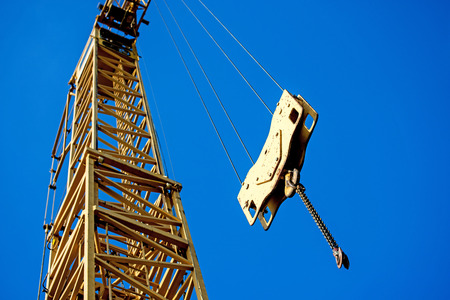 building crane with chain and hookの写真素材